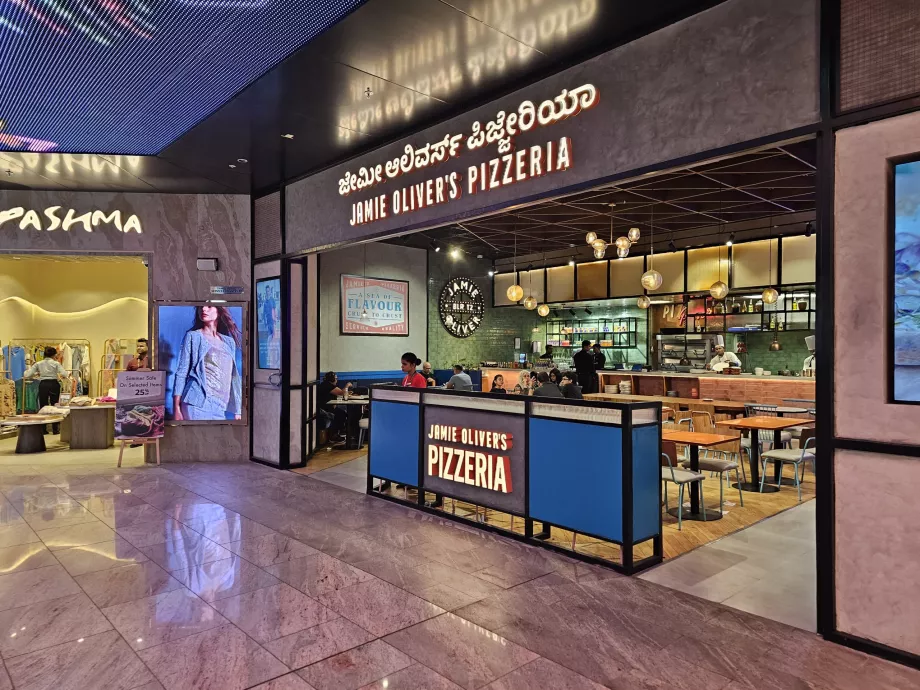 Pizzeria Jamieho Olivera, terminál 2, tranzitná zóna