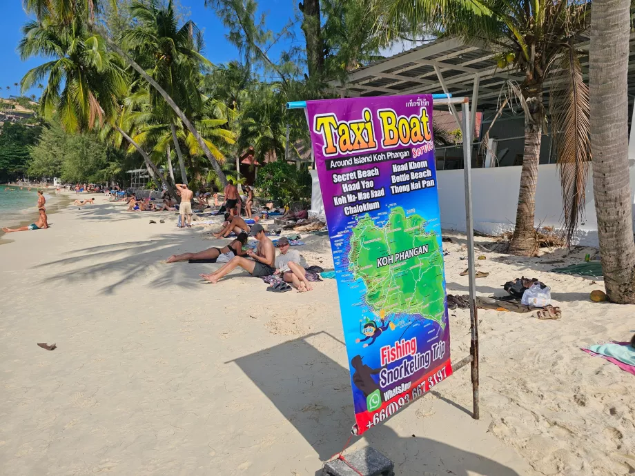 Salátová pláž, čln s taxíkom